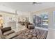 Open living space with a seamless flow from the kitchen to dining area, and access to the lanai at 7408 S Serenoa Dr, Sarasota, FL 34241