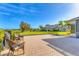 Brick patio with seating, perfect for enjoying the serene backyard views at 7408 S Serenoa Dr, Sarasota, FL 34241