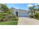 Beautiful single-Gathering home with an attached garage and well-maintained landscaping provides great curb appeal at 8110 Trimbelle Ter, Parrish, FL 34219