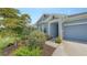 Charming single-story home with mature landscaping and inviting entryway at 8110 Trimbelle Ter, Parrish, FL 34219