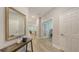 Welcoming hallway with stylish decor and seamless flow into the living spaces at 8110 Trimbelle Ter, Parrish, FL 34219