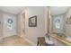 Inviting foyer with stylish decor, leading to the home's interior spaces at 8110 Trimbelle Ter, Parrish, FL 34219