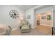 Home office featuring a comfortable seating area and a view into the main living space, perfect for remote work at 8110 Trimbelle Ter, Parrish, FL 34219