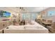 Spacious living room blends with the dining area creating a cozy and bright space at 8110 Trimbelle Ter, Parrish, FL 34219