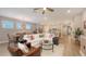 Open living space showcases a stylish living room and an adjacent dining area at 8110 Trimbelle Ter, Parrish, FL 34219
