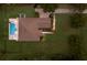 Bird's eye view of landscaped backyard with private pool and well-manicured lawn at 8223 Snowy Egret Pl, Bradenton, FL 34202