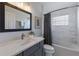 Clean bathroom featuring a well-lit vanity, a shower, and a bathtub combination at 8223 Snowy Egret Pl, Bradenton, FL 34202