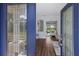 Welcoming entryway featuring a view into the living space and beautiful wood floors at 8223 Snowy Egret Pl, Bradenton, FL 34202