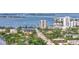 Panoramic aerial view of the community featuring water views, bridge, and nearby city skyline at 825 S Osprey Ave # 302, Sarasota, FL 34236