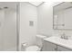 Clean bathroom with a shower, toilet, and vanity with modern fixtures at 825 S Osprey Ave # 302, Sarasota, FL 34236