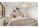 Stylishly furnished bedroom with a comfortable bed, accent pillows, and elegant decor at 825 S Osprey Ave # 302, Sarasota, FL 34236