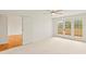Bedroom with outdoor terrace, carpet, and lots of natural light at 825 S Osprey Ave # 302, Sarasota, FL 34236