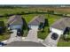 Charming single-Gathering homes feature brick driveways, two-car garages, and manicured lawns at 8313 Ocean Tides Cv, Parrish, FL 34219