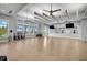 Bright, spacious fitness center with hardwood floors and state-of-the-art equipment at 8313 Ocean Tides Cv, Parrish, FL 34219