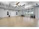 Bright, spacious fitness center with hardwood floors and state-of-the-art equipment at 8313 Ocean Tides Cv, Parrish, FL 34219
