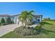 Charming single-story home with a well-manicured lawn and inviting curb appeal at 8313 Ocean Tides Cv, Parrish, FL 34219