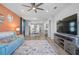 Bright and airy living room with open concept, dining area and kitchen offers great flow for entertaining at 8313 Ocean Tides Cv, Parrish, FL 34219
