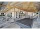 Spacious outdoor dining area with ample seating, perfect for social gatherings and relaxation at 8313 Ocean Tides Cv, Parrish, FL 34219