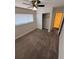 Bedroom featuring a closet, a ceiling fan, and a window at 940 Byron Ct # 17C, Sarasota, FL 34243