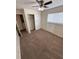 Bedroom featuring a closet, a ceiling fan, and a window at 940 Byron Ct # 17C, Sarasota, FL 34243