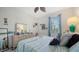 Bright bedroom with view to window and TV mount at 5356 Mang Pl # 1404, Sarasota, FL 34238