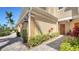 Exterior elevation of home at 5356 Mang Pl # 1404, Sarasota, FL 34238