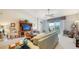 Inviting living room with lanai access and decorative furnishings at 5356 Mang Pl # 1404, Sarasota, FL 34238