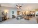 Open-concept living room and dining area offering ample natural light and spacious design at 5356 Mang Pl # 1404, Sarasota, FL 34238