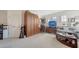 Bright living room boasting a comfortable seating area and built-in features at 5356 Mang Pl # 1404, Sarasota, FL 34238