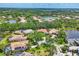 Stunning aerial view of homes and the community's multiple ponds and lakes at 11551 30Th E Cv, Parrish, FL 34219