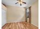 Cozy bedroom with hardwood floors, closet, neutral walls, and natural light at 11551 30Th E Cv, Parrish, FL 34219