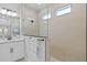 Luxurious bathroom with frameless glass shower and a modern, neutral design at 11719 Chevelon Ln, Parrish, FL 34219
