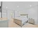 Inviting bedroom with soft hues, plush bedding, and plenty of space at 11719 Chevelon Ln, Parrish, FL 34219