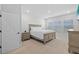 Bright bedroom featuring neutral color scheme and comfortable furnishings at 11719 Chevelon Ln, Parrish, FL 34219