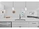 Kitchen island with stainless steel sink at 11719 Chevelon Ln, Parrish, FL 34219