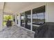 Covered patio showcasing seamless indoor-outdoor living with view of pool area at 11719 Chevelon Ln, Parrish, FL 34219