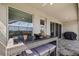 Outdoor bar area on patio offers casual seating and views of the backyard at 11719 Chevelon Ln, Parrish, FL 34219