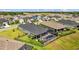A beautiful home with a screened-in pool and a well-maintained lawn at 11719 Chevelon Ln, Parrish, FL 34219