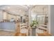 An eat-in kitchen features modern appliances, ample cabinet space, and seamless flow into other living spaces at 13130 50Th E Ct, Parrish, FL 34219