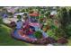 Vibrant community playground with diverse equipment and colorful design for Gathering fun at 13130 50Th E Ct, Parrish, FL 34219