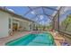 The screened-in pool with plenty of patio space is ideal for outdoor entertaining and Gathering fun at 13130 50Th E Ct, Parrish, FL 34219