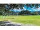 Expansive soccer field with well-maintained grass, surrounded by lush trees, is perfect for sports at 13130 50Th E Ct, Parrish, FL 34219