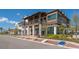 Street scene with shops, outdoor seating, and recreational game set up for community enjoyment at 13130 50Th E Ct, Parrish, FL 34219