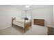 Bedroom with carpet, neutral walls, a ceiling fan, and plantation shutters at 13612 11Th E Ter, Bradenton, FL 34212