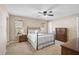 Neutral bedroom with carpeted floor, and coordinated furniture at 13612 11Th E Ter, Bradenton, FL 34212