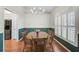 Formal dining room featuring hardwood floors, chair rail and traditional decor at 13612 11Th E Ter, Bradenton, FL 34212