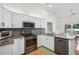 Bright kitchen features stainless appliances, granite countertops, and modern backsplash at 13612 11Th E Ter, Bradenton, FL 34212