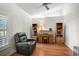 Comfortable home office with built-in shelves and lots of natural light at 13612 11Th E Ter, Bradenton, FL 34212