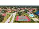 This community features tennis courts, a swimming pool, and a clubhouse near a scenic pond at 1431 57Th W St # 1431, Bradenton, FL 34209