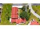 Aerial view showing the red tile roofs, landscaping, and manicured lawns of the community at 1431 57Th W St # 1431, Bradenton, FL 34209